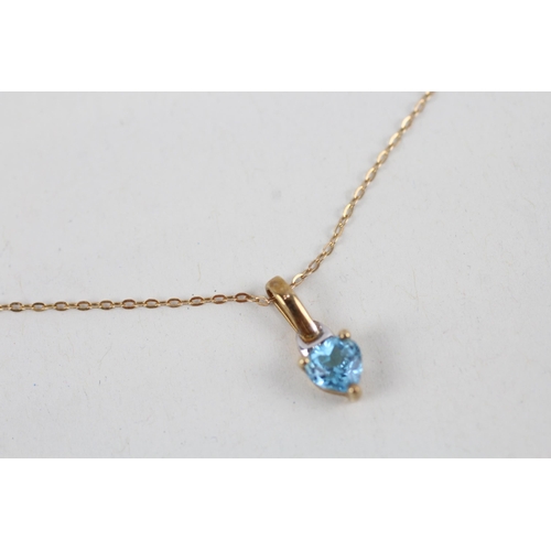 256 - 9ct gold heart cut blue topaz set solitaire pendant necklace (1g)