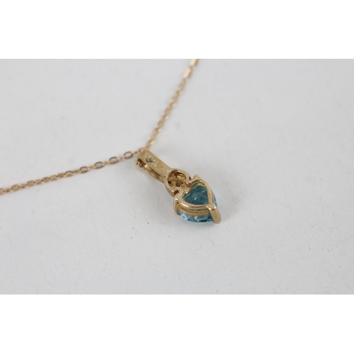 256 - 9ct gold heart cut blue topaz set solitaire pendant necklace (1g)