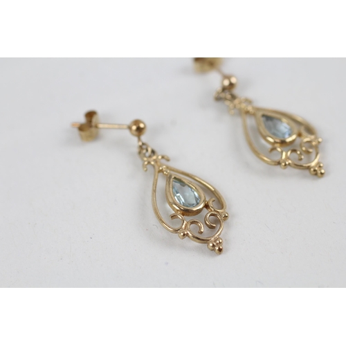 258 - 9ct gold blue topaz set drop earrings (1.4g)