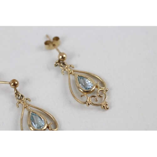 258 - 9ct gold blue topaz set drop earrings (1.4g)