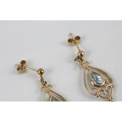 258 - 9ct gold blue topaz set drop earrings (1.4g)