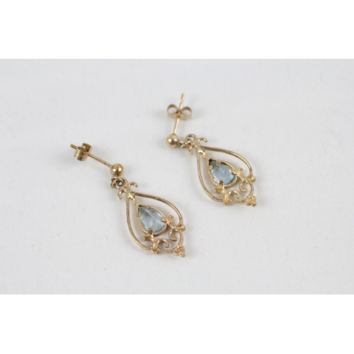 258 - 9ct gold blue topaz set drop earrings (1.4g)