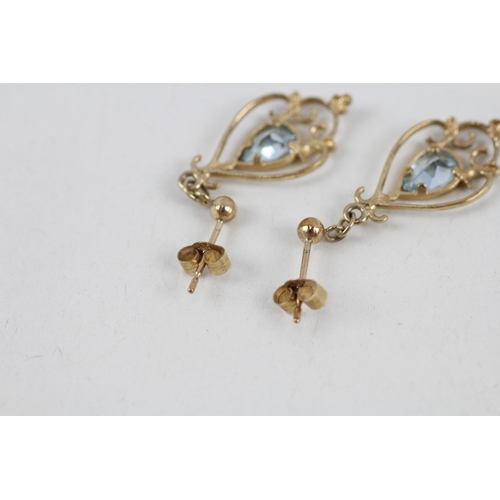 258 - 9ct gold blue topaz set drop earrings (1.4g)