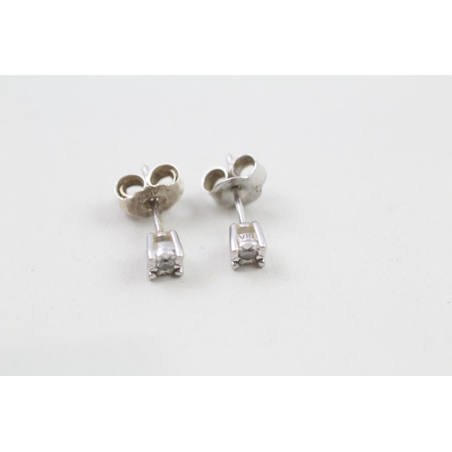 260 - 9ct white gold diamond stud earrings (0.9g)