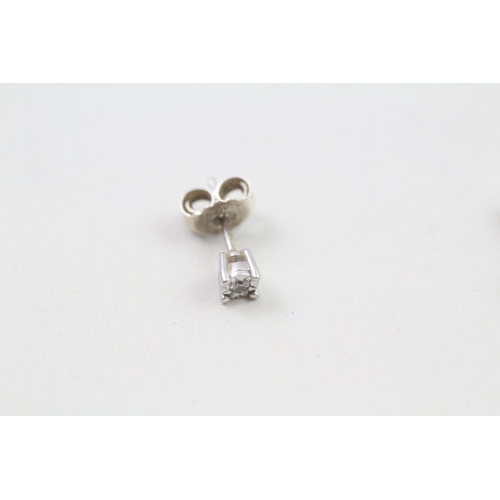 260 - 9ct white gold diamond stud earrings (0.9g)