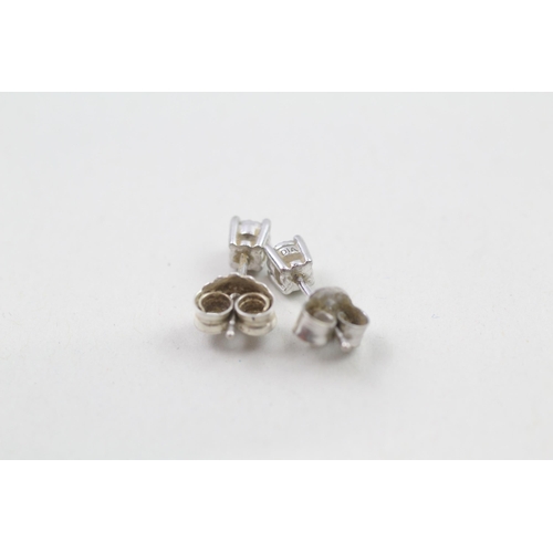 260 - 9ct white gold diamond stud earrings (0.9g)