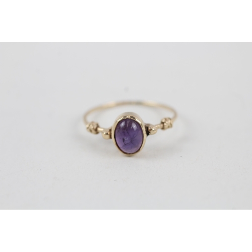 264 - 9ct gold amethyst cabochon set delicate dress ring (1.2g) Size  K 1/2