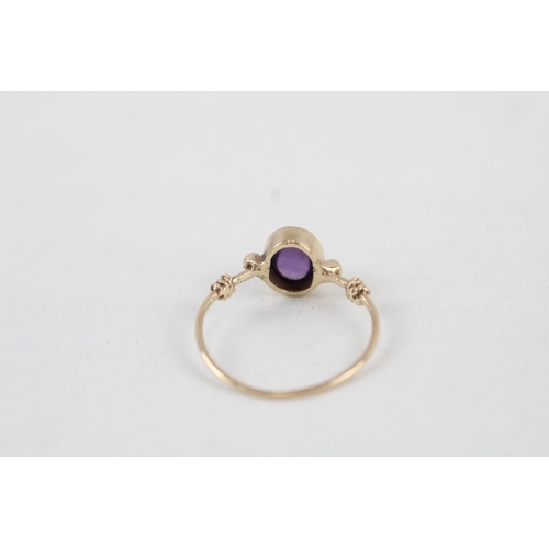 264 - 9ct gold amethyst cabochon set delicate dress ring (1.2g) Size  K 1/2