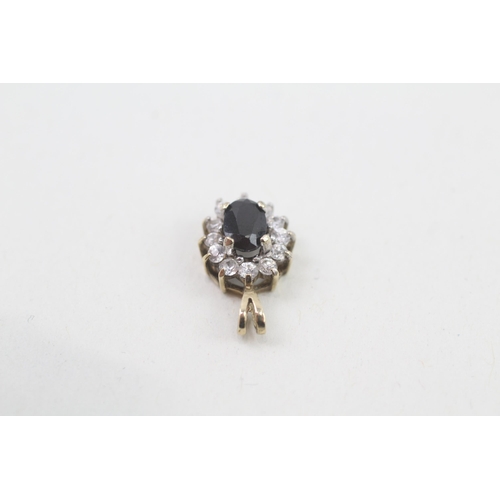 271 - 2 x 9ct gold cz and sapphire set cluster pendants (2.7g)