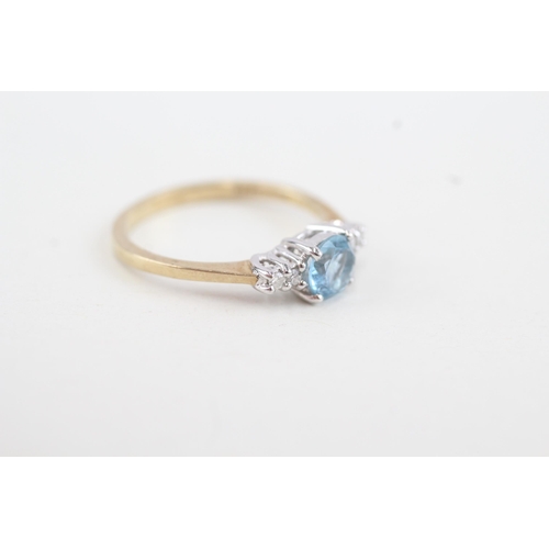 279 - 9ct gold diamond and blue topaz set dress ring (1.9g) Size  N