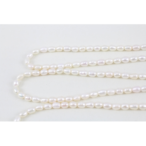 284 - 9ct gold cultured and baroque pearl set necklace (49.2g)