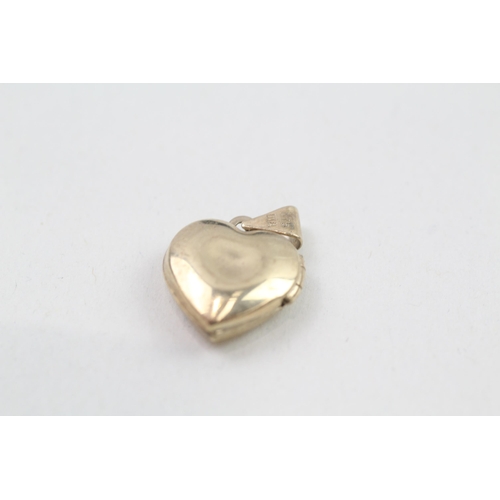 285 - 9ct gold diamond heart locket (0.9g)