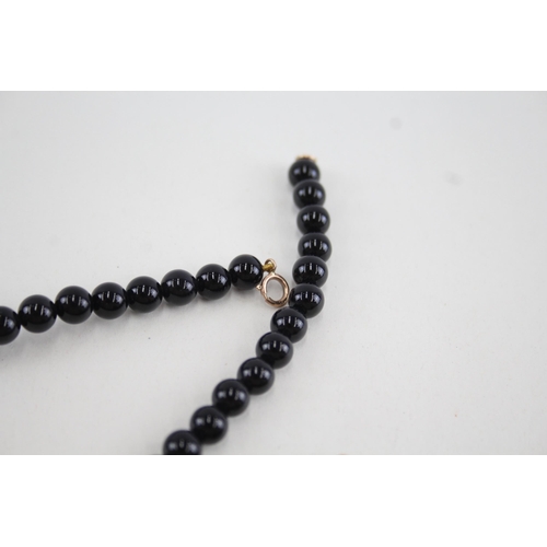 45 - 2x 9ct gold black onyx necklaces (47.7g)