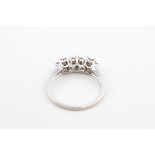 59 - 9ct white gold diamond set cluster trilogy ring (2.6g) Size  N