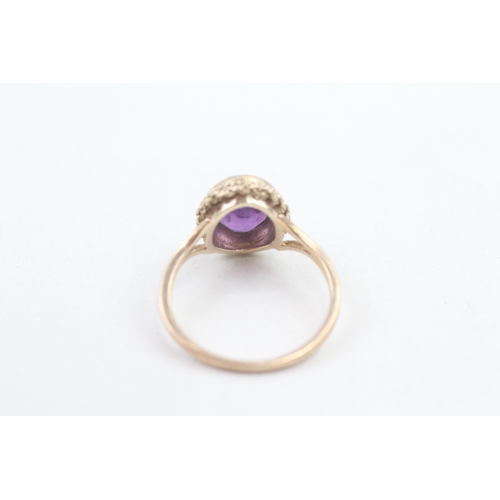 6 - 9ct gold amethyst set rope bordered solitaire cocktail ring (3.2g) Size  O