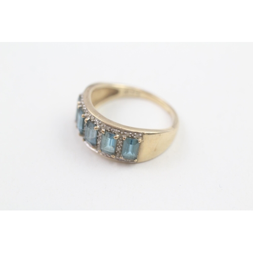 60 - 9ct gold baguette cut blue topaz and diamond set five stone eternity ring (3.4g) Size  O