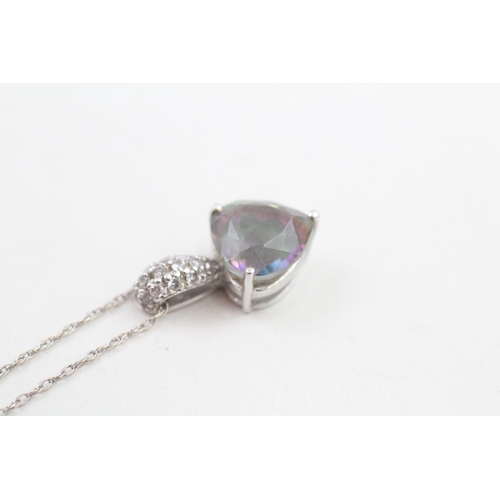 65 - 14ct white gold diamond accented heart cut enhanced mystic topaz set pendant necklace (3.4g)