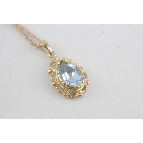66 - 9ct gold pear shaped topaz pendant necklace (2.7g)