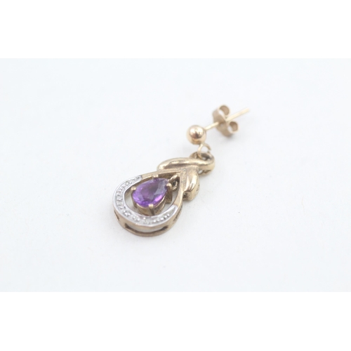 68 - 9ct gold diamond accented amethyst teardrop shaped drop earrings (2.7g)