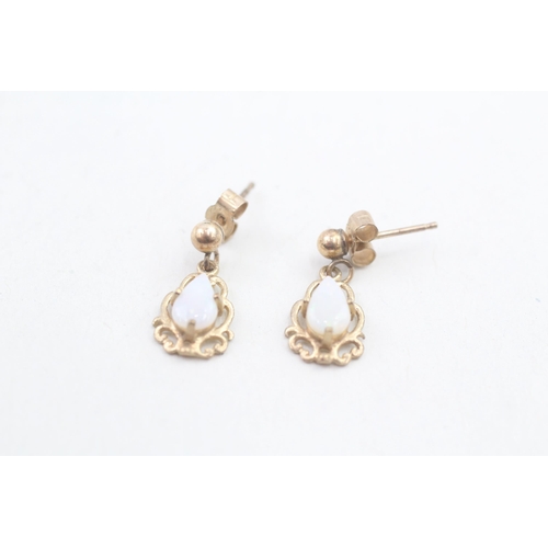 70 - 9ct gold pear cut opal set drop earrings (0.9g)