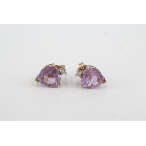 79 - 9ct gold diamond & amethyst heart stud earrings (1.3g)