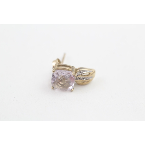 81 - 9ct gold diamond accented chequer cut amethyst set stud earrings (3.2g)