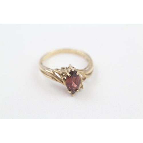 86 - 9ct gold citrine accented marquise cut garnet set dress ring (2.5g) Size  N