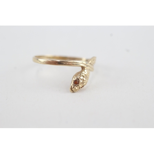 90 - 9ct gold snake ring with citrine paste eyes (1.2g)