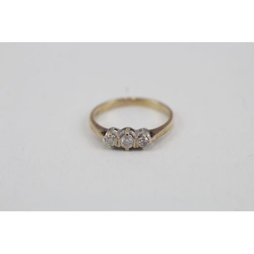 103 - 9ct gold diamond three stone ring (1.5g) Size  M