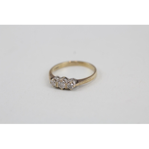 103 - 9ct gold diamond three stone ring (1.5g) Size  M