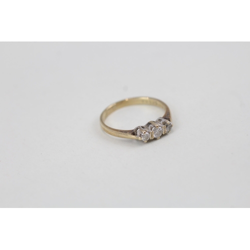 103 - 9ct gold diamond three stone ring (1.5g) Size  M