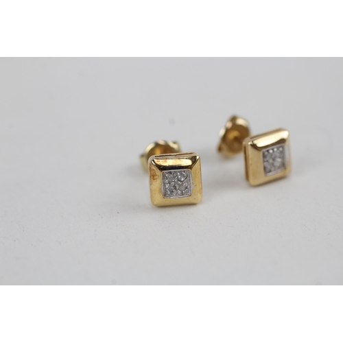 104 - 9ct gold diamond stud earrings (1.2g)