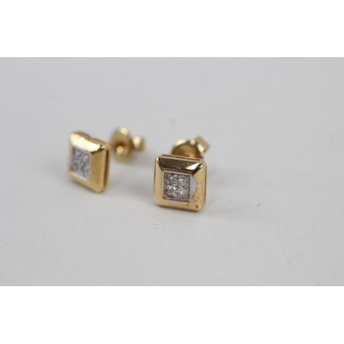 104 - 9ct gold diamond stud earrings (1.2g)