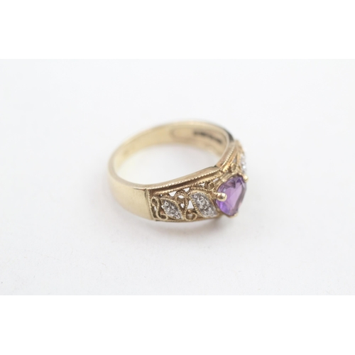 112 - 9ct gold diamond accented heart cut amethyst dress ring (3.5g) Size  M