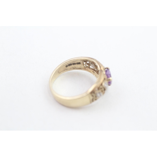 112 - 9ct gold diamond accented heart cut amethyst dress ring (3.5g) Size  M