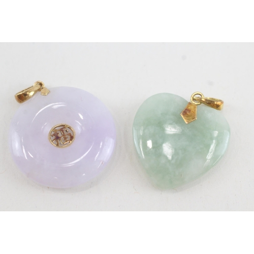 117 - 2x 9ct gold vari-hue jade pendants (8.4g)