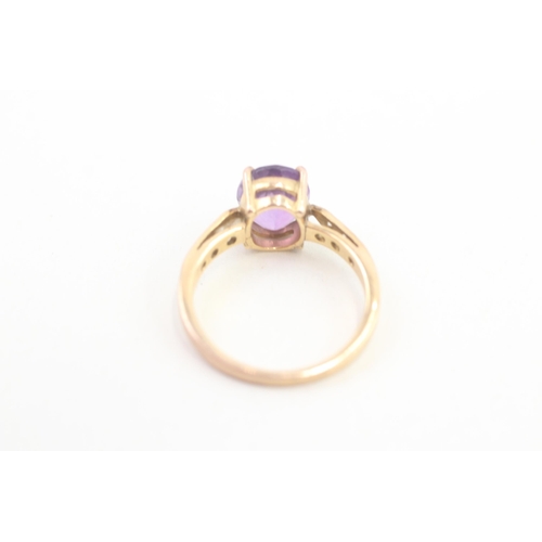 125 - 9ct gold diamond accent chequer cut amethyst set dress ring (3.4g) Size  P