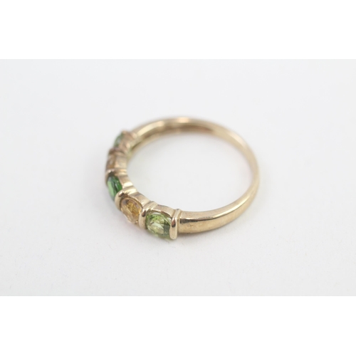 129 - 9ct gold peridot, citrine & diopside half eternity ring, bar set (2.1g) Size  P