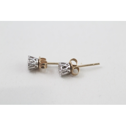 135 - 9ct white and yellow gold illusion set diamond stud earrings (0.8g)