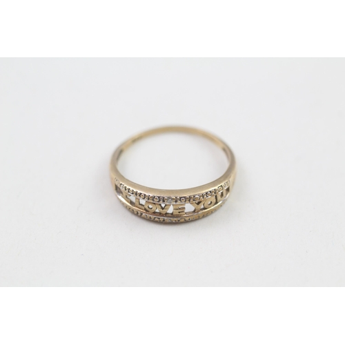 31 - 9ct gold diamond 'I love you' open work ring (1.1g) Size  L