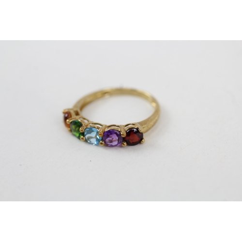 34 - 9ct gold citrine, diopside, topaz, amethyst and garnet set five stone band ring (1.4g) Size  K