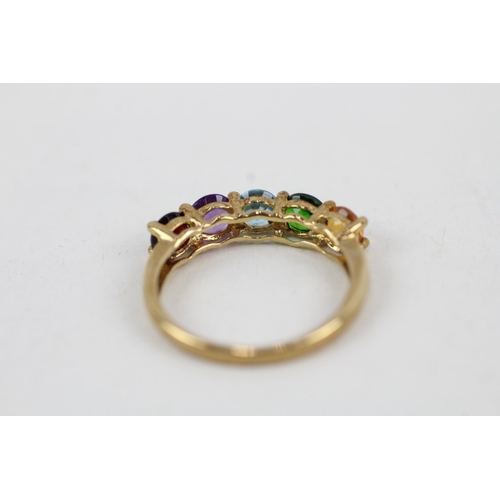 34 - 9ct gold citrine, diopside, topaz, amethyst and garnet set five stone band ring (1.4g) Size  K