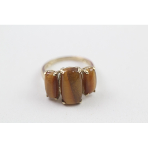 39 - 9ct gold tigers eye trilogy ring (3.6g) Size  M