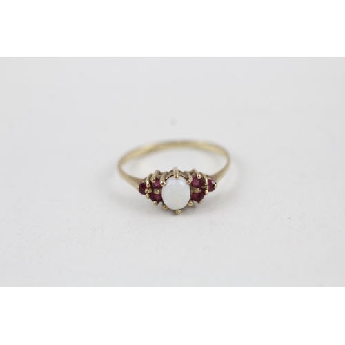 4 - 9ct gold opal and ruby dress ring (0.9g) Size  I