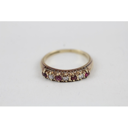 43 - 9ct gold vintage ruby and diamond set seven stone eternity ring (2.2g) Size  N