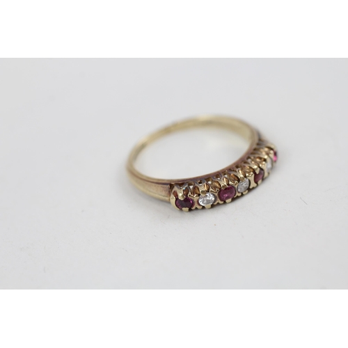 43 - 9ct gold vintage ruby and diamond set seven stone eternity ring (2.2g) Size  N