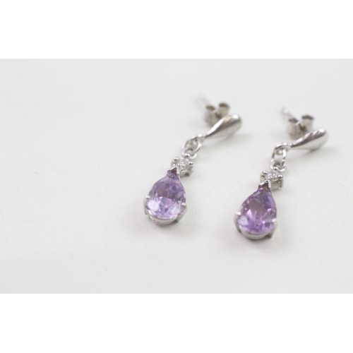 44 - 9ct white gold diamond and amethyst drop earrings (1.3g)