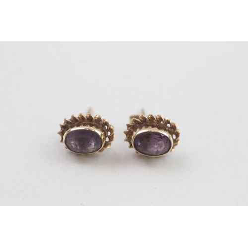 50 - 9ct gold amethyst stud earrings (1.4g)