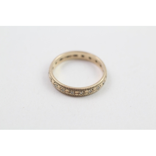 51 - 9ct gold diamond eternity ring (1.5g) Size  J