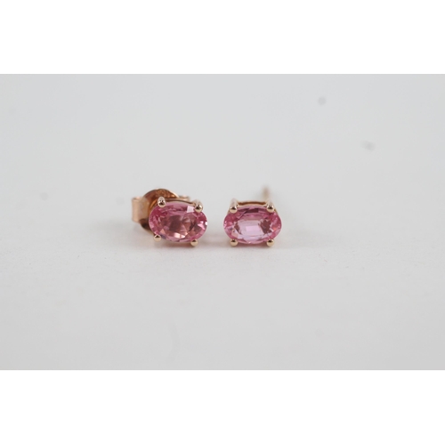 58 - 9ct rose gold pink sapphire set stud earrings (1.1g)